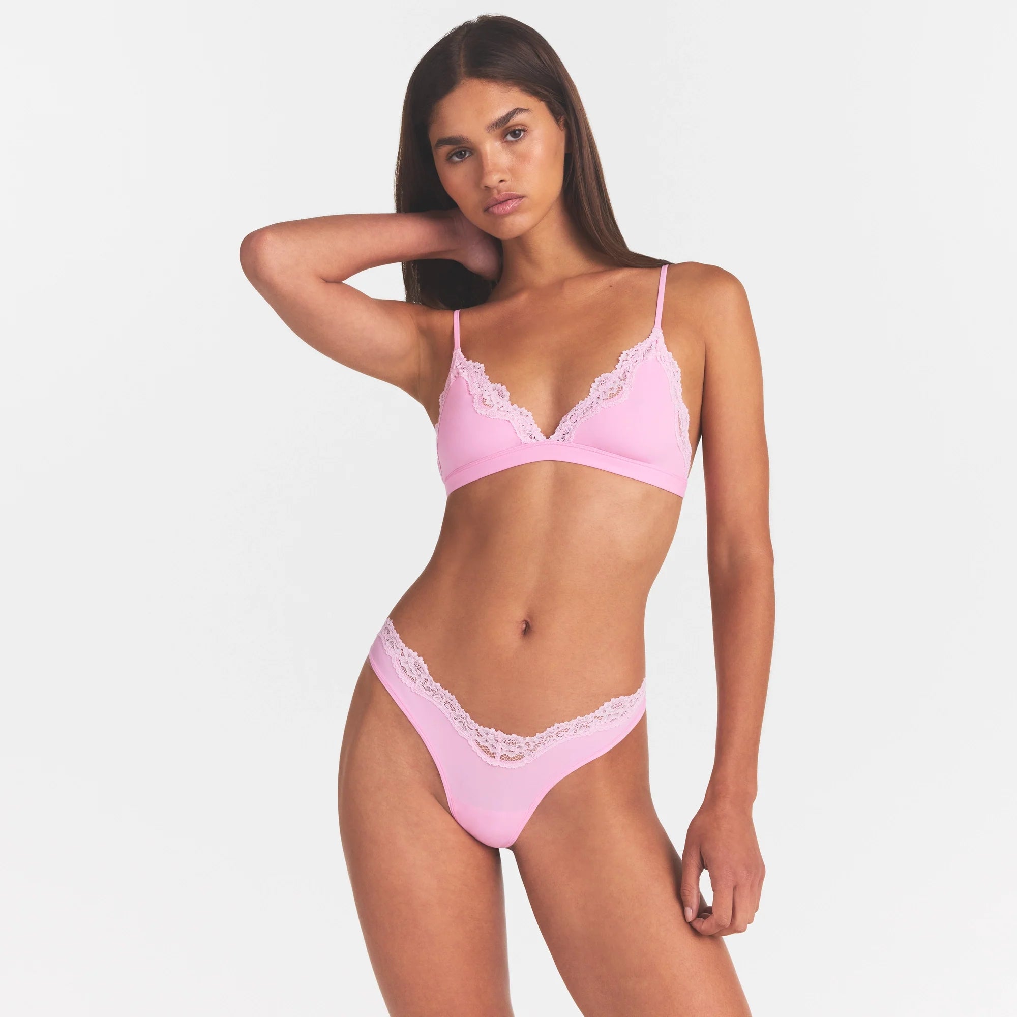 FITS EVERYBODY LACE DIPPED THONG | BUBBLE GUM TONAL ON A MODEL FRONT VIEW @ | FOCUS: 0.0, 1.0, 0.9