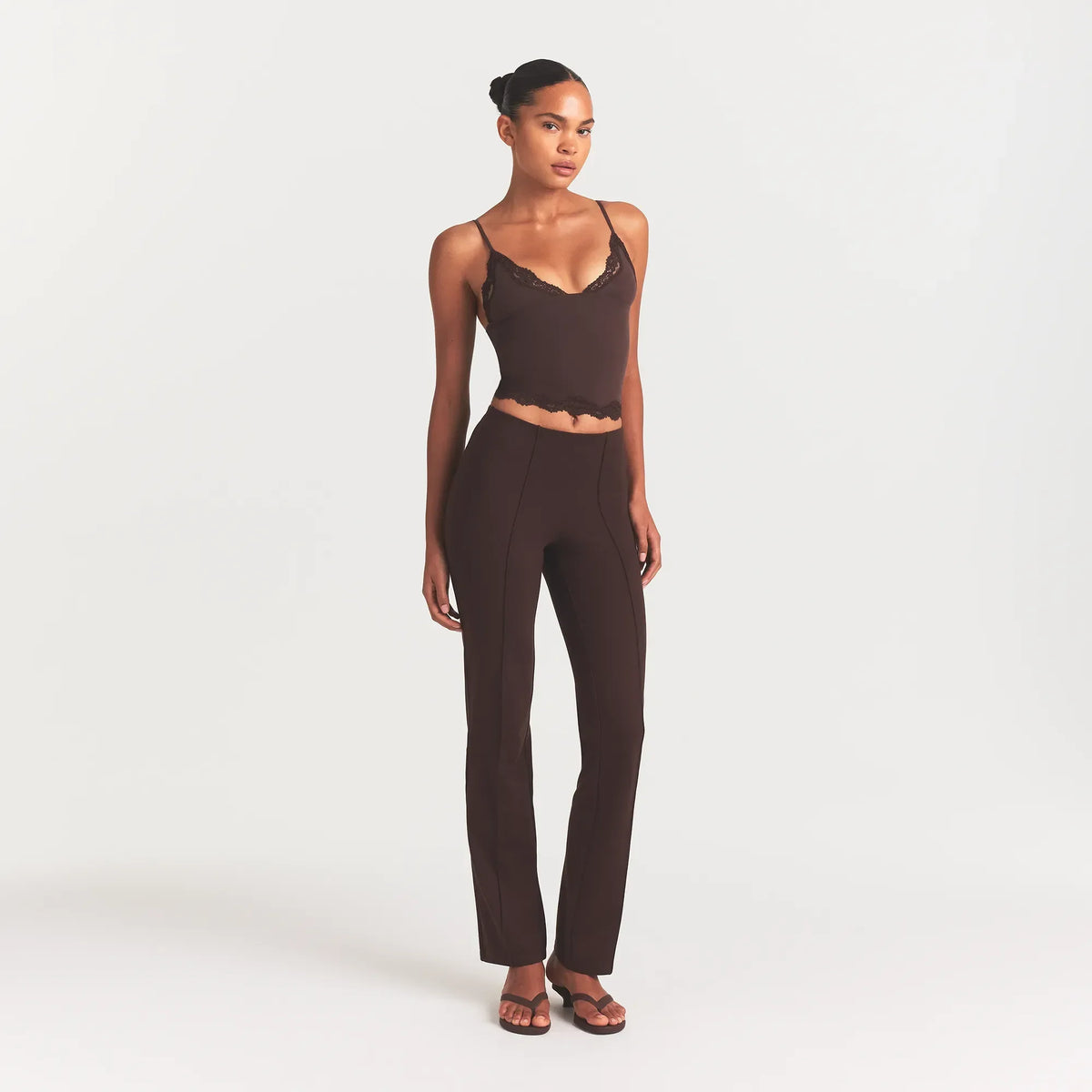 THE ESSENTIAL COLLECTION HIGH-WAISTED PINTUCK STRAIGHT PANT | ESPRESSO ON A MODEL FRONT VIEW @ | FOCUS: 0.0, 1.0, 0.9