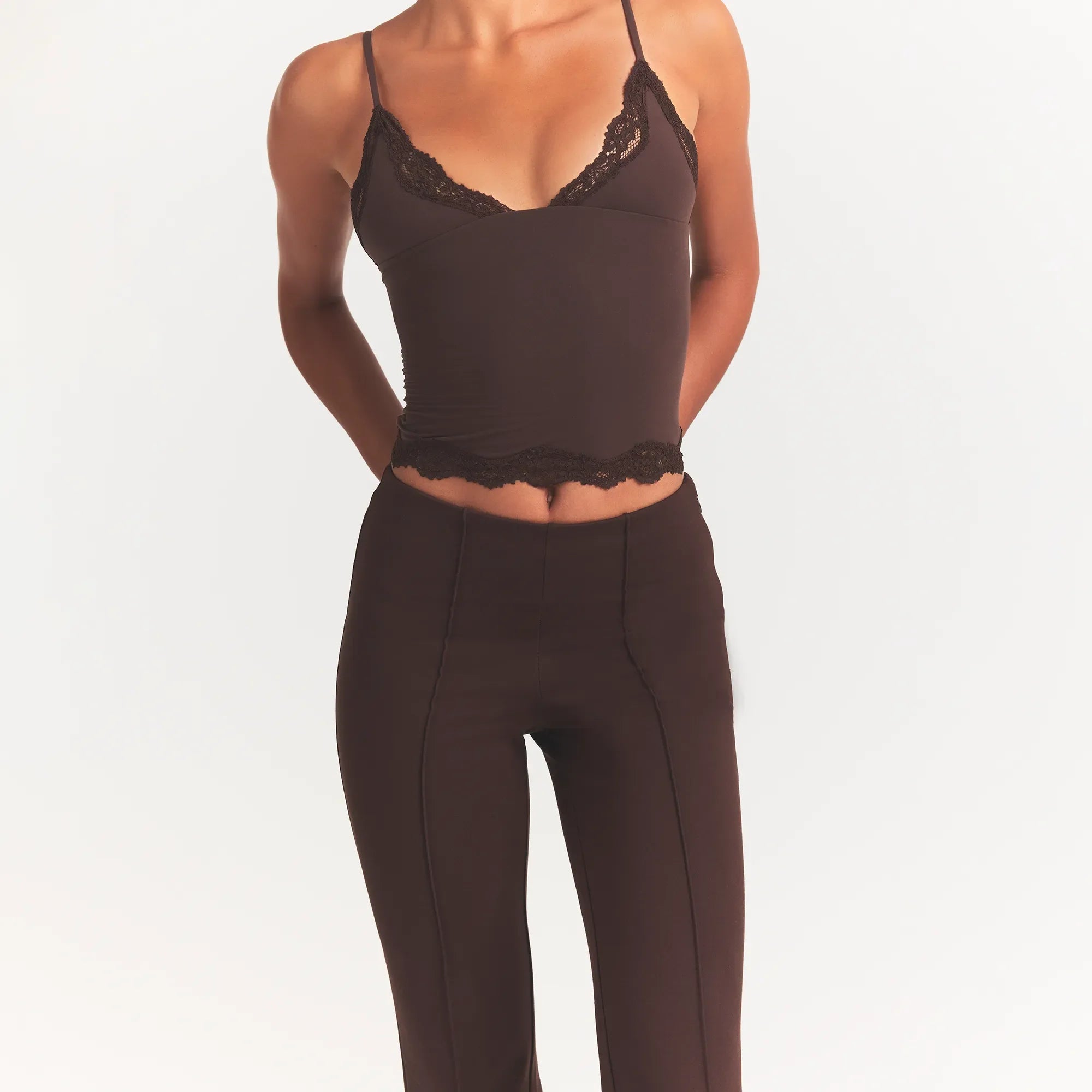 THE ESSENTIAL COLLECTION HIGH-WAISTED PINTUCK STRAIGHT PANT | ESPRESSO ON A MODEL FRONT VIEW @ | FOCUS: 0.0, 1.0, 0.9