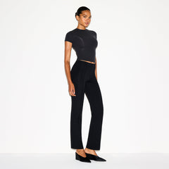 THE ESSENTIAL COLLECTION HIGH-WAISTED PINTUCK STRAIGHT LEG PANT | OBSIDIAN ON A MODEL FRONT VIEW @ | FOCUS: 0.0, 1.0, 0.9