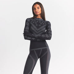 SKIMS FIRST LAYERS LEGGING | OBSIDIAN WINTER FAIR ISLE ON A MODEL SIDE VIEW @ | FOCUS: 0.0, 1.0, 0.9
