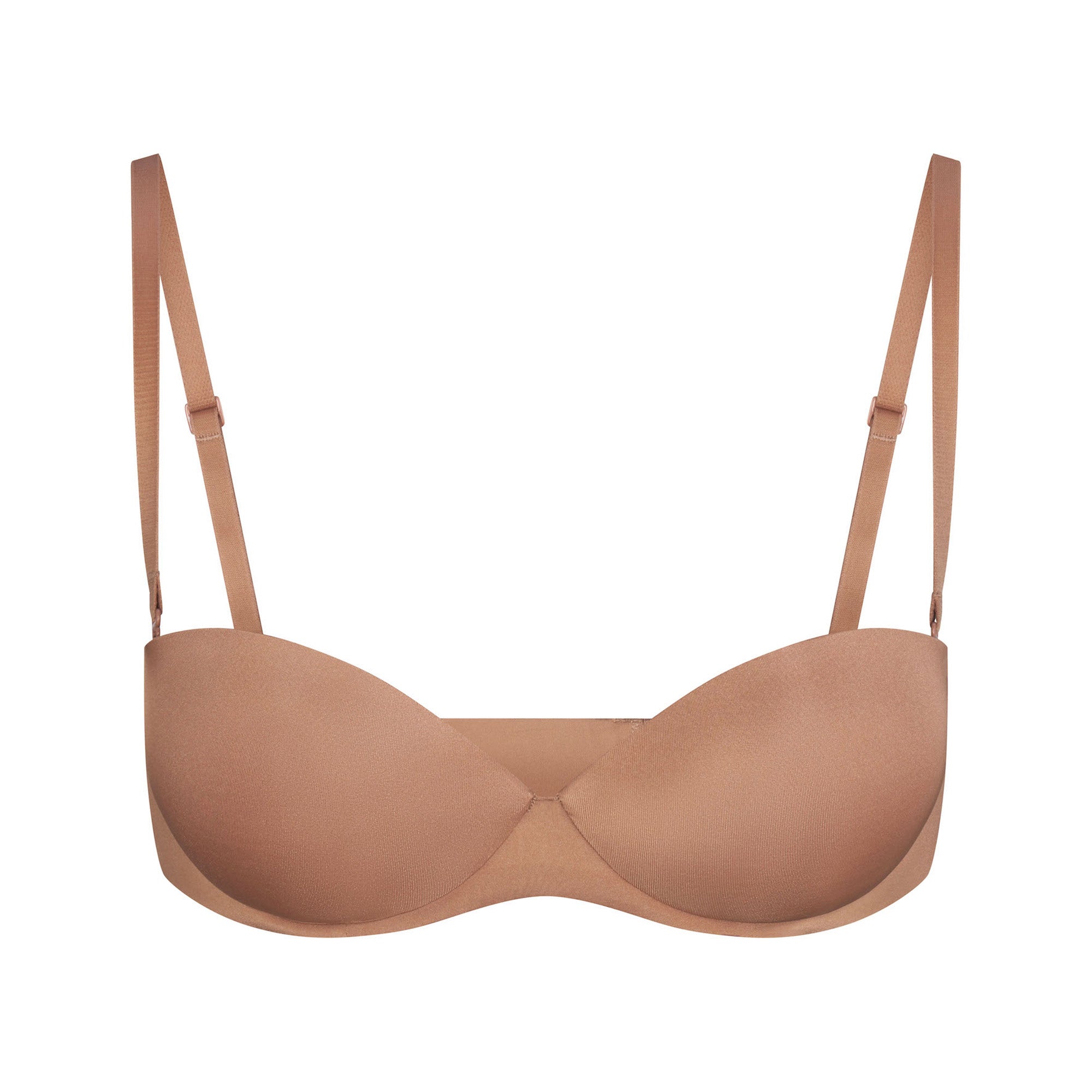 SKIMS ULTIMATE BRA STRAPLESS PUSH-UP BRA LAYS FLAT ON A WHITE BACKGROUND | FLT