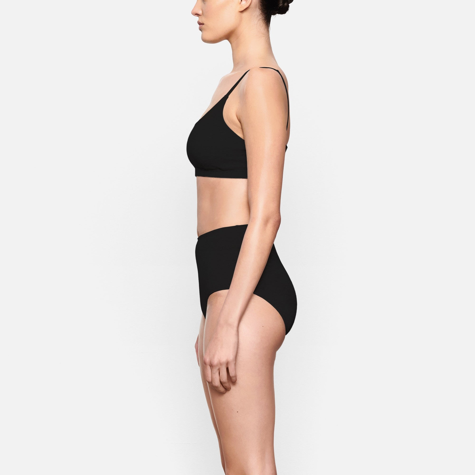COTTON JERSEY SCOOP BRALETTE WORN BY A MODEL IN SIDE VIEW