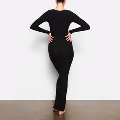 WORN BY A MODEL IN BACK VIEW SOFT LOUNGE LONG SLEEVE DRESS IN ONYX