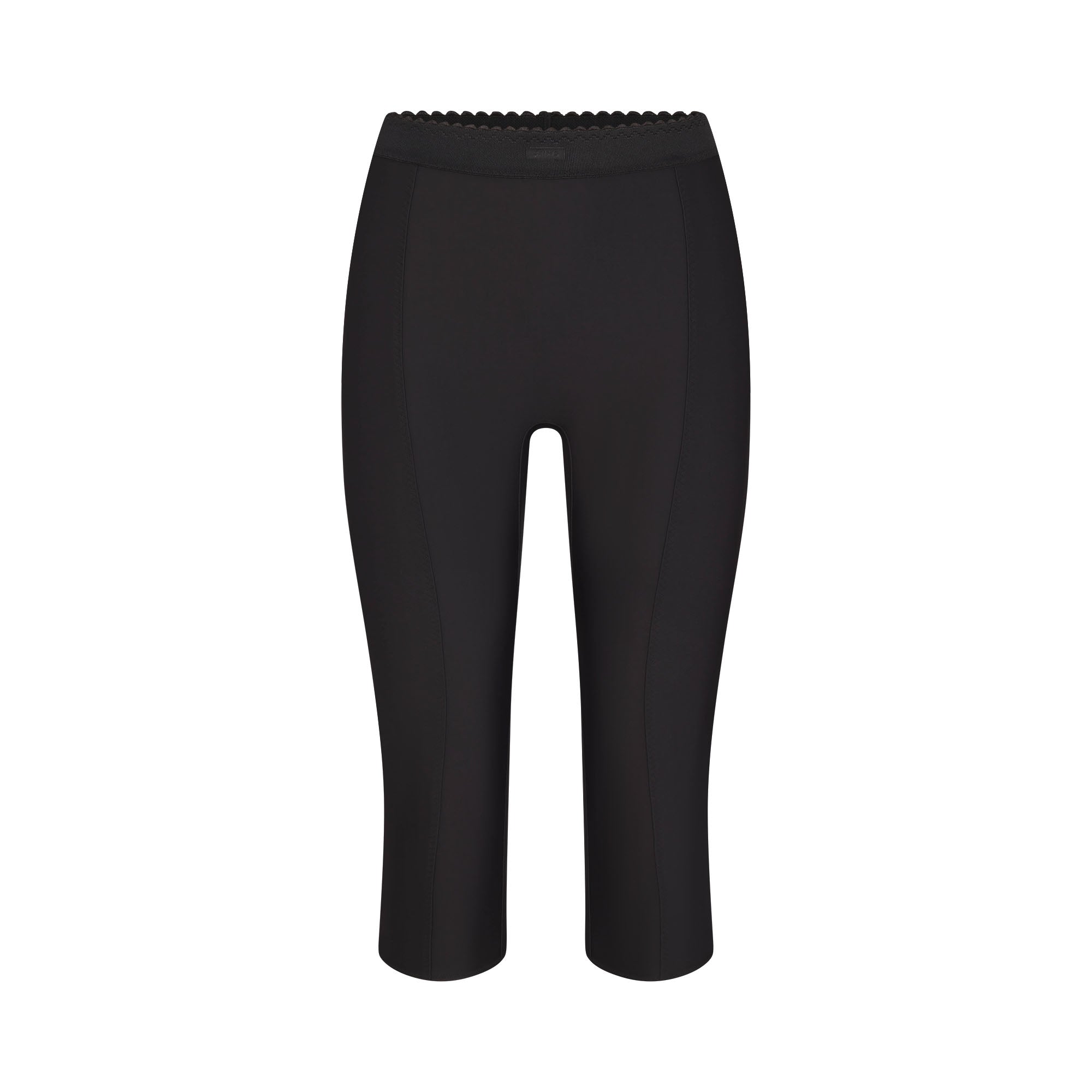 SKIMS BODY HIGH-WAISTED CAPRI | ONYX FLAT ON A WHITE BACKGROUND | FLT