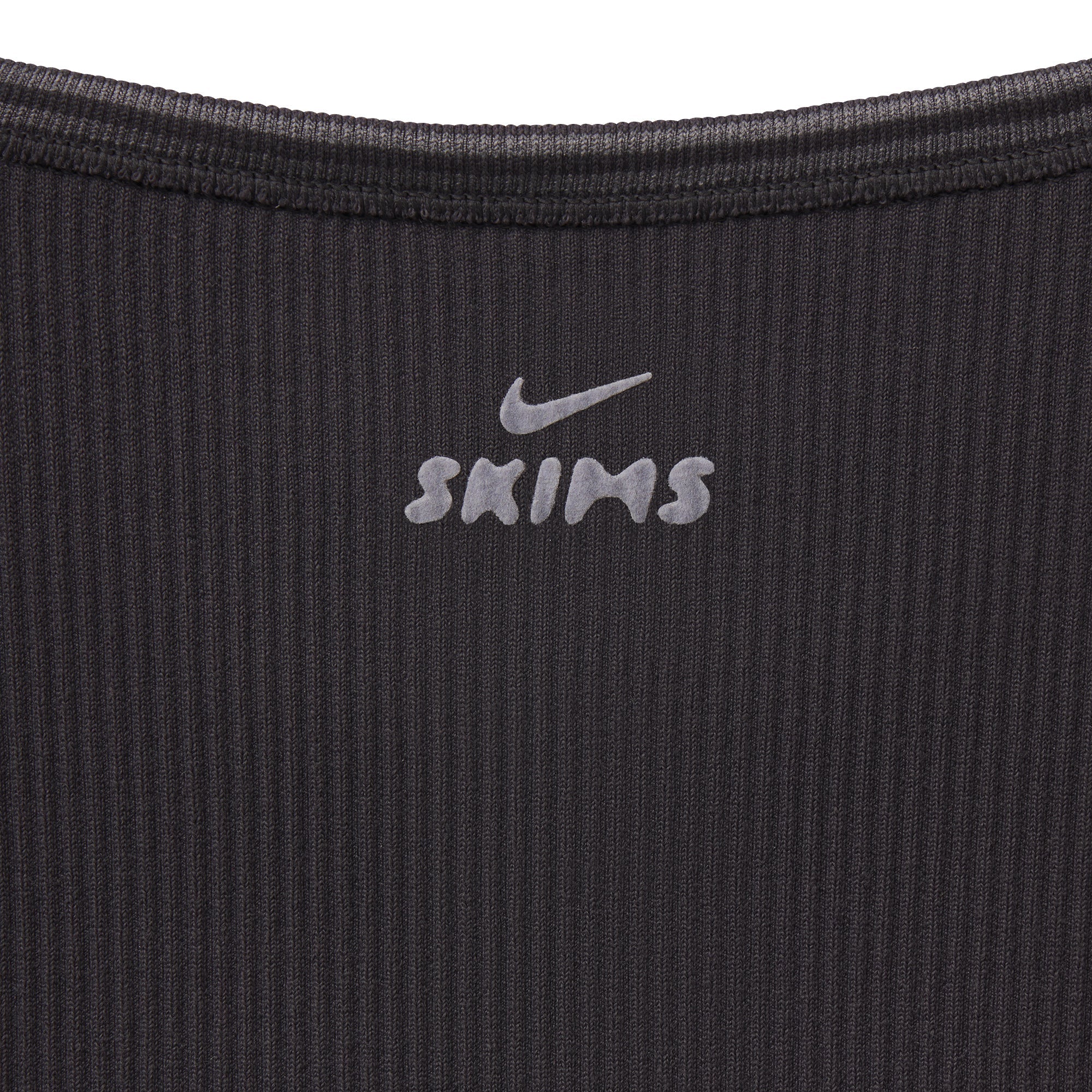 NikeSKIMS RIBBED SEAMLESS CAMI | OBSIDIAN & LAYS FLAT ON A WHITE BACKGROUND | FLT