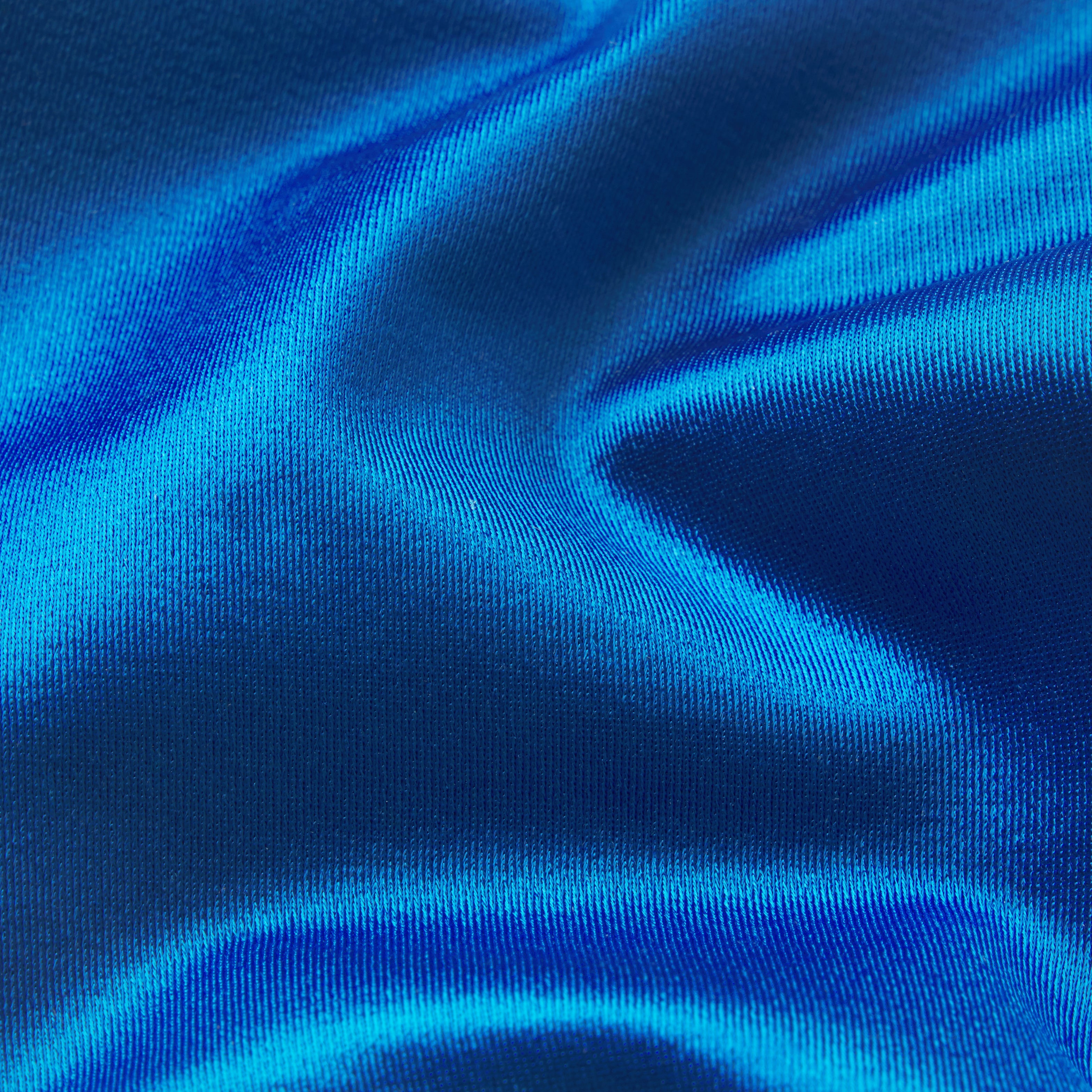 NikeSKIMS SATIN SHINE PLUNGE T-BACK BRA | COBALT & LAYS FLAT ON A WHITE BACKGROUND | FLT
