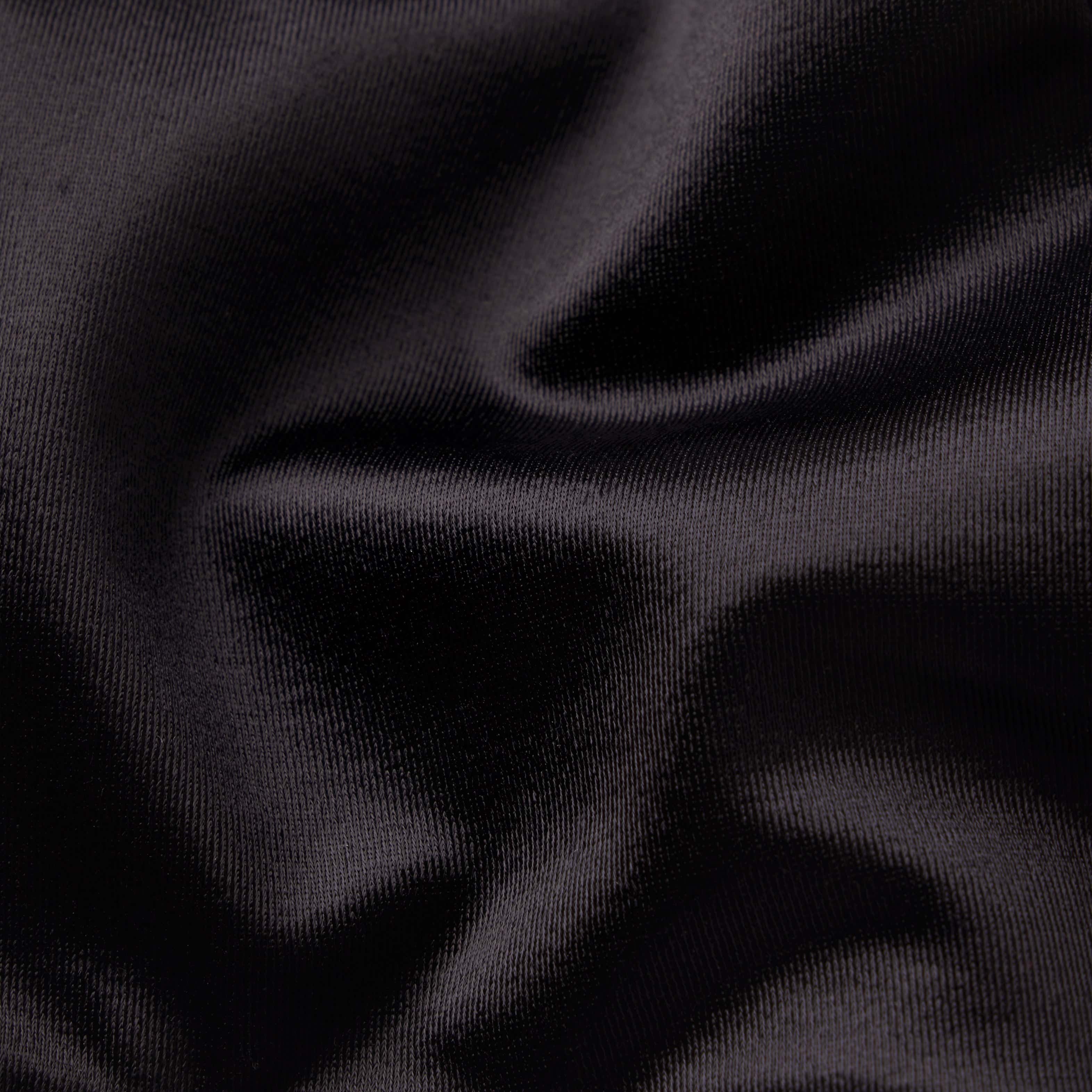 NikeSKIMS SATIN SHINE RACERBACK BRA | OBSIDIAN & LAYS FLAT ON A WHITE BACKGROUND | FLT