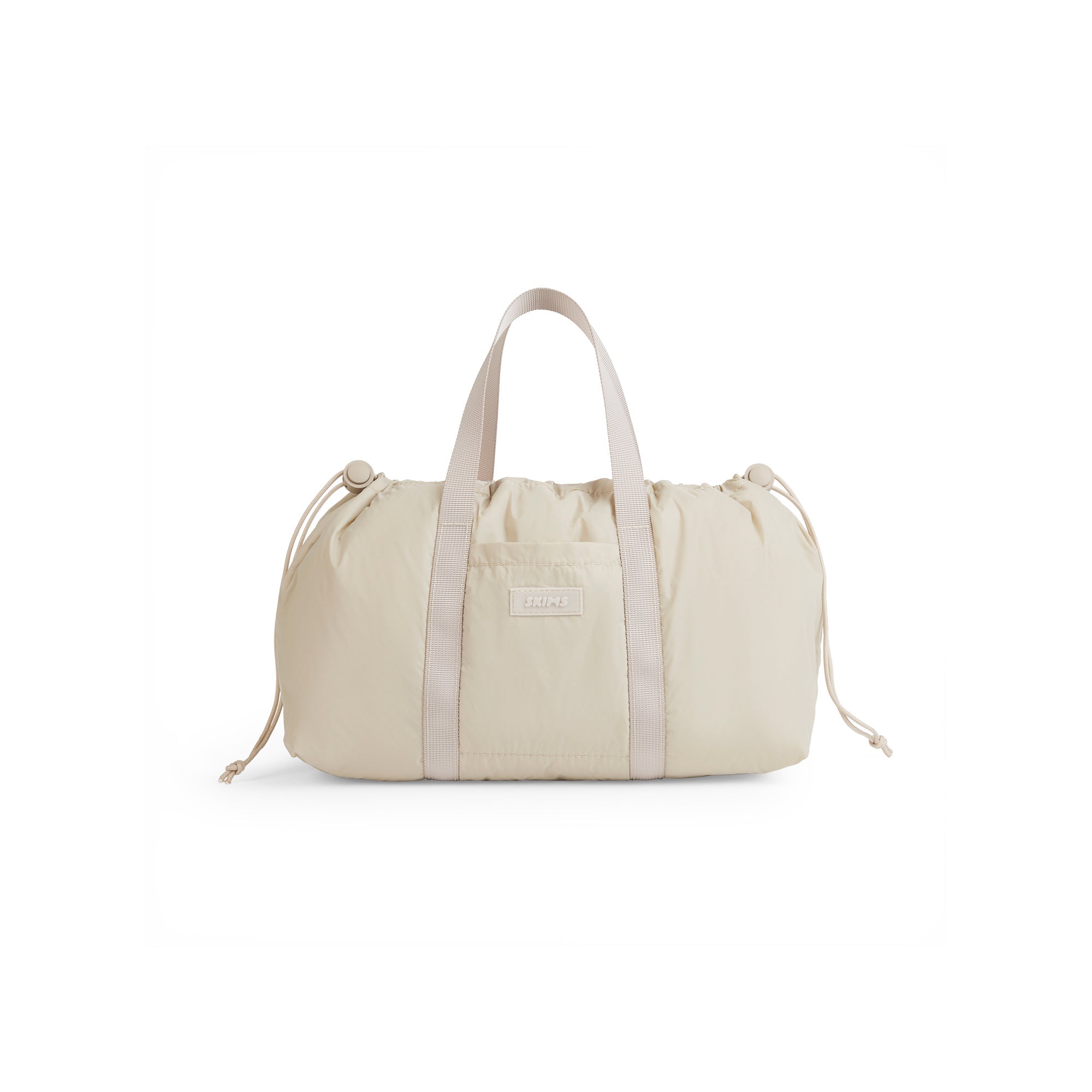 MINI LIGHTWEIGHT DRAWSTRING DUFFLE BAG | STONE FLAT ON A WHITE BACKGROUND | FLT