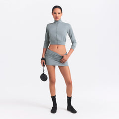 NikeSKIMS AIRY FOLDOVER SKORT | WASHED PACIFIC ON A MODEL FRONT VIEW @ | FOCUS: 0.0, 1.0, 0.9
