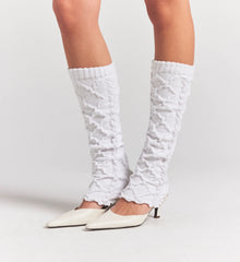 COZY CABLE LEG WARMERS | IVORY ON A MODEL SIDE VIEW @ | FOCUS: 0.0, 1.0, 0.9