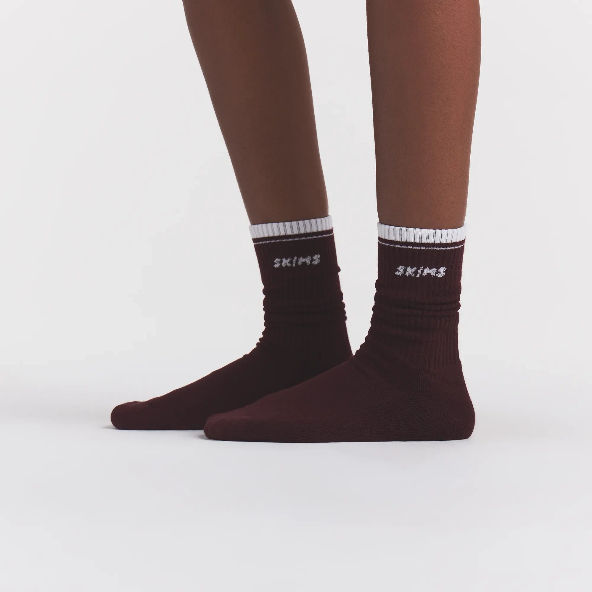 RIBBED CREW LOGO SOCK 3-PACK | CURRANT SNOW MULTI ON A MODEL | FOCUS: 0.0, 1.0, 0.9