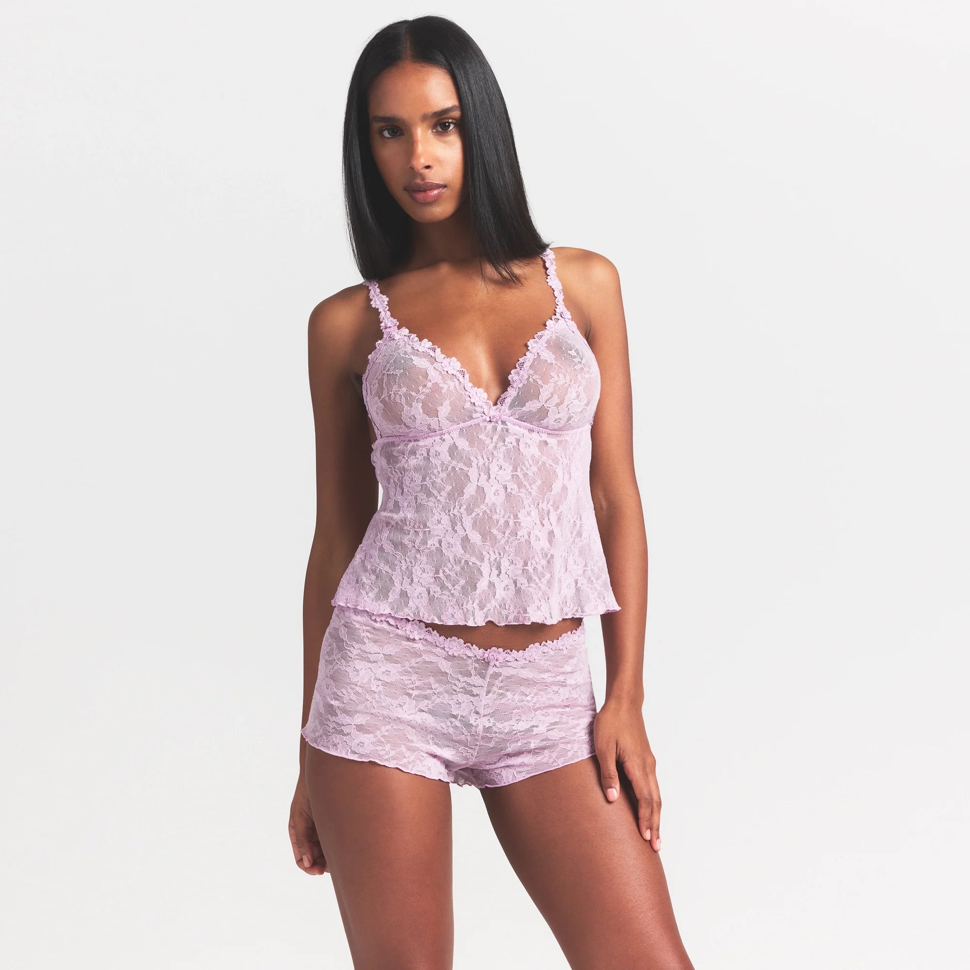 STRETCH LACE TRIANGLE CAMI AND SHORT SET | BABY PINK ON A MODEL SIDE VIEW @ | FOCUS: 0.0, 1.0, 0.9