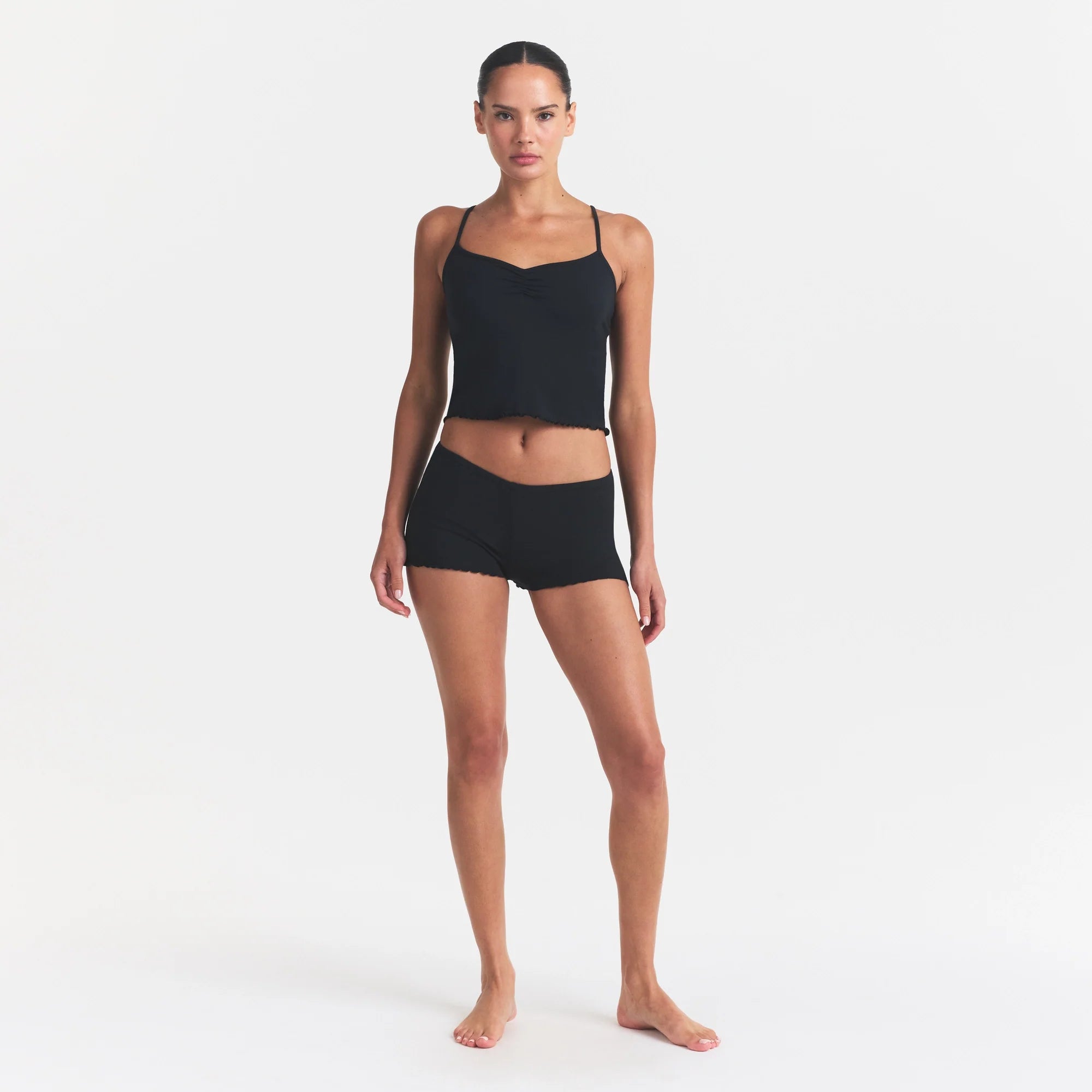 SKIMS SLEEP CAMI SET | ONYX ON A MODEL FRONT VIEW @ | FOCUS: 0.0, 1.0, 0.9