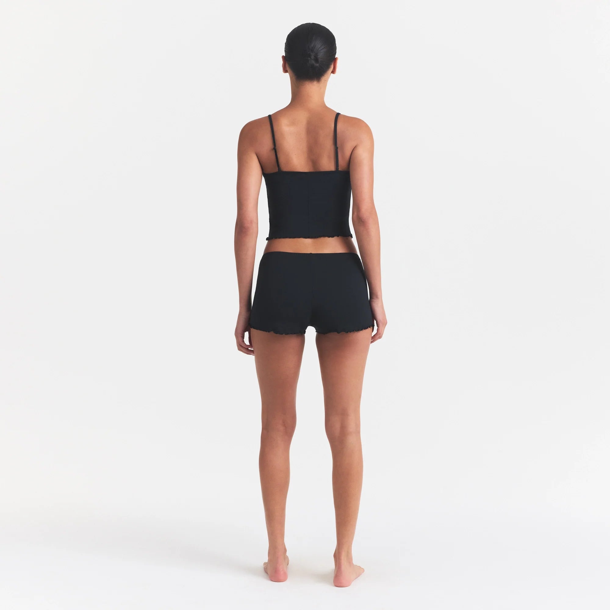 SKIMS SLEEP CAMI SET | ONYX ON A MODEL FRONT VIEW @ | FOCUS: 0.0, 1.0, 0.9