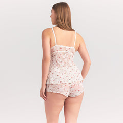 STRETCH LACE BABYDOLL TOP | IVORY CHERRY PRINT ON A MODEL SIDE VIEW @ | FOCUS: 0.0, 1.0, 0.9