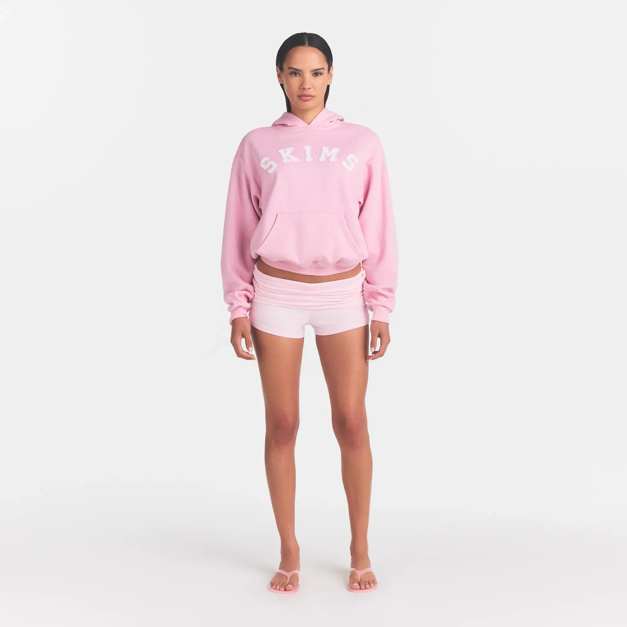 COTTON FLEECE CLASSIC HOODIE | HALITE WITH SNOW LOGO ON A MODEL FRONT VIEW @ | FOCUS: 0.0, 1.0, 0.9