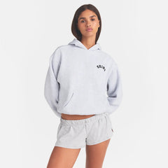 COTTON FLEECE CLASSIC HOODIE | LIGHT HEATHER GREY WITH ONYX LOGO ON A MODEL FRONT VIEW @ | FOCUS: 0.0, 1.0, 0.9