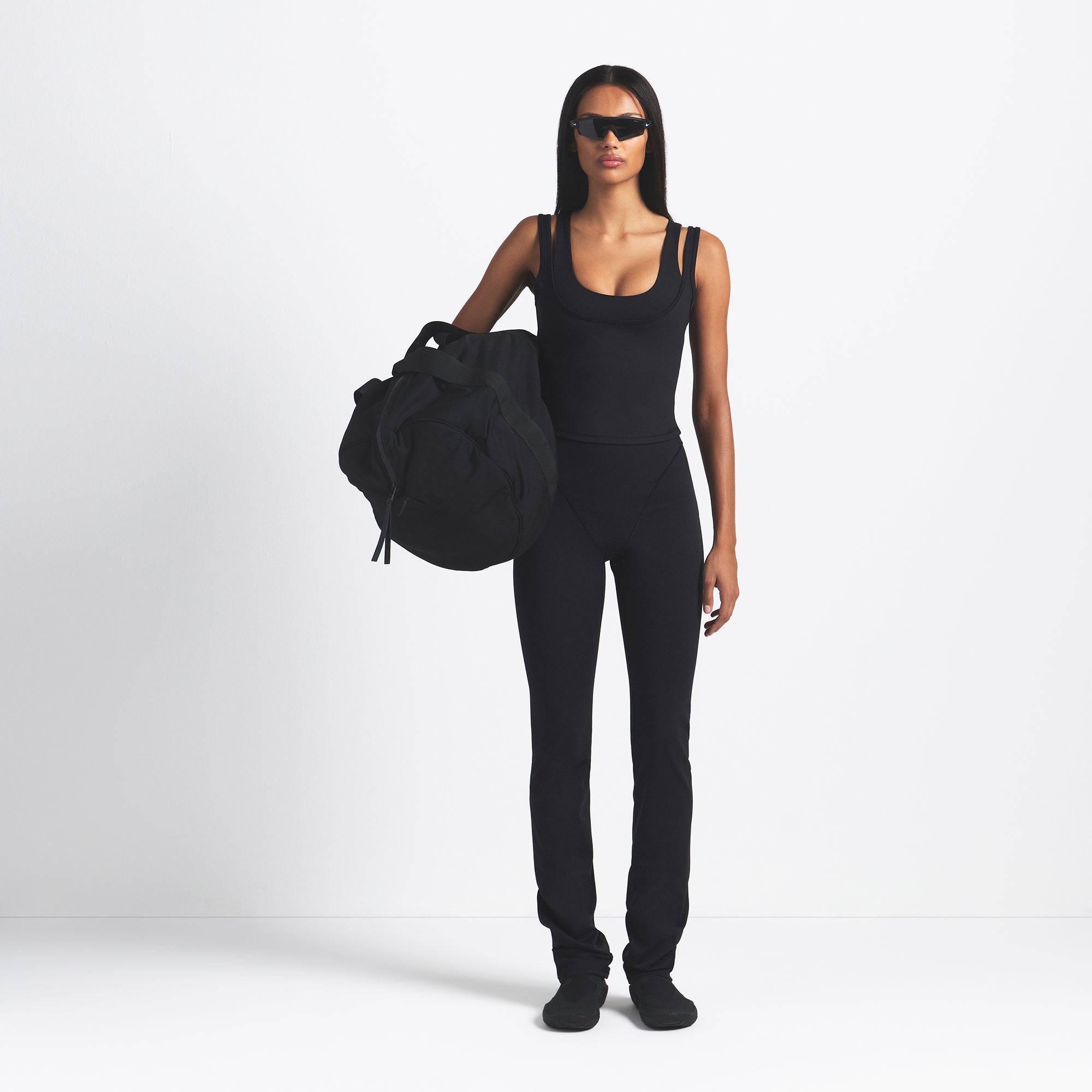 NikeSKIMS MATTE DOUBLE STRAP SCOOP TANK | OBSIDIAN ON A MODEL FRONT VIEW @ | FOCUS: 0.9, 0.1, 0.7
