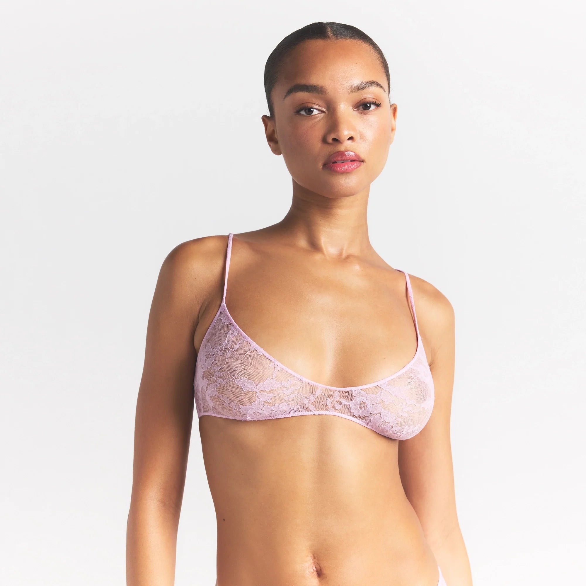 STRETCH LACE SKIMPY SCOOP BRALETTE | BABY PINK ON A MODEL SIDE VIEW @ | FOCUS: 0.0, 1.0, 0.9