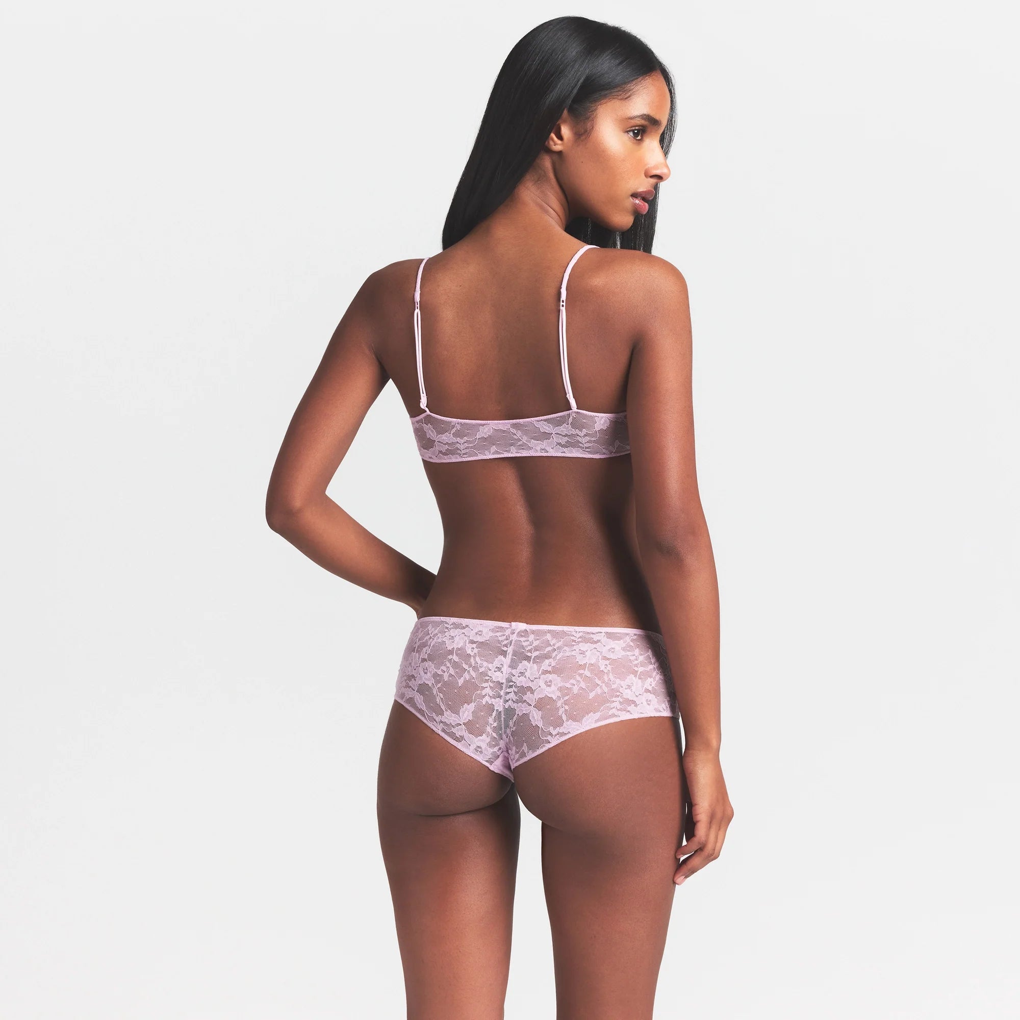STRETCH LACE SKIMPY SCOOP BRALETTE | BABY PINK ON A MODEL SIDE VIEW @ | FOCUS: 0.0, 1.0, 0.9