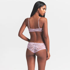 STRETCH LACE SKIMPY SCOOP BRALETTE | BABY PINK ON A MODEL SIDE VIEW @ | FOCUS: 0.0, 1.0, 0.9