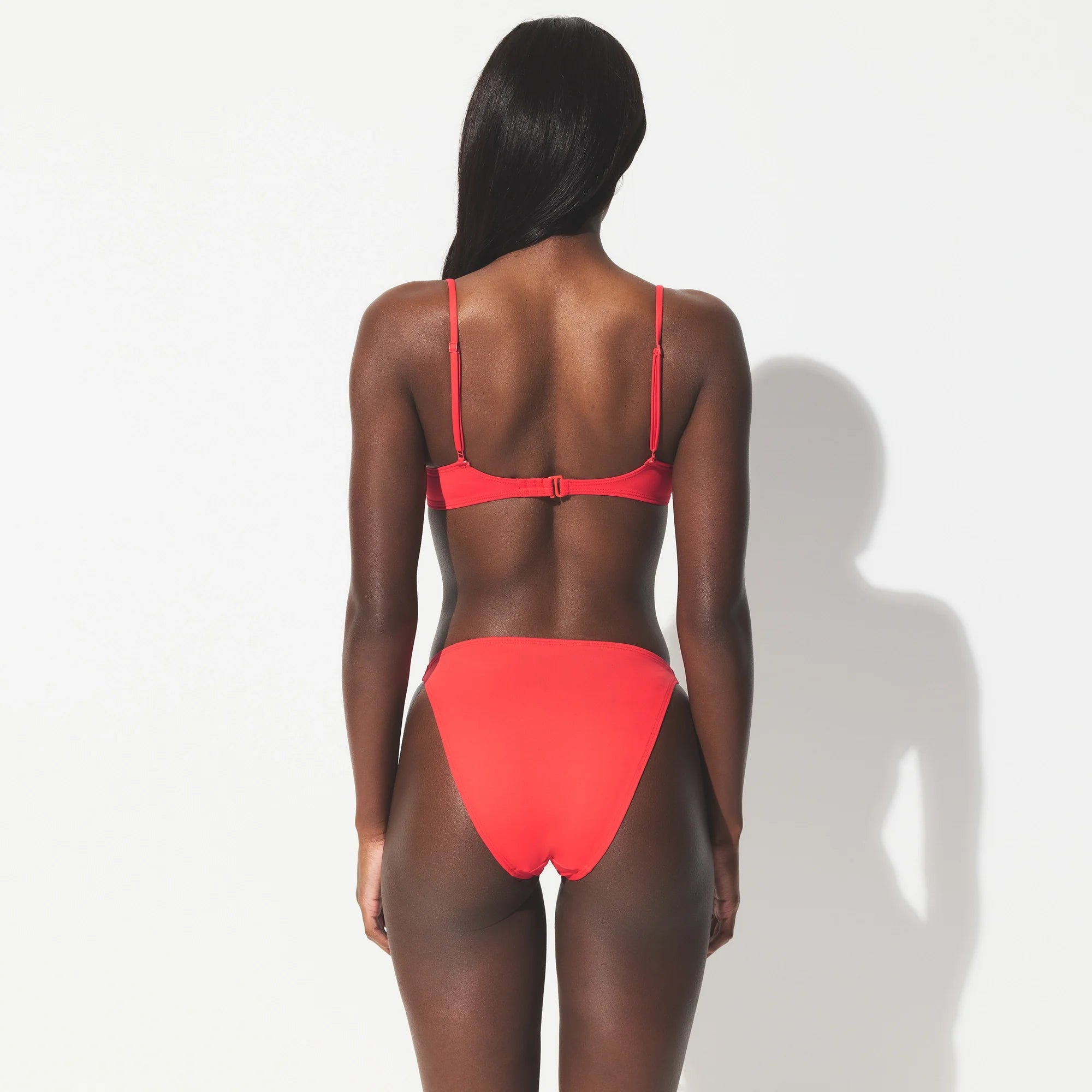 ICONIC SWIM UNDERWIRE DEMI BIKINI TOP | CARMINE ON A MODEL SIDE VIEW