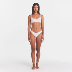 LIGHTWEIGHT COTTON THONG 10-PACK | MICRO DOT FLORAL MULTI ON A MODEL FRONT VIEW @ | FOCUS: 0.0, 1.0, 0.9